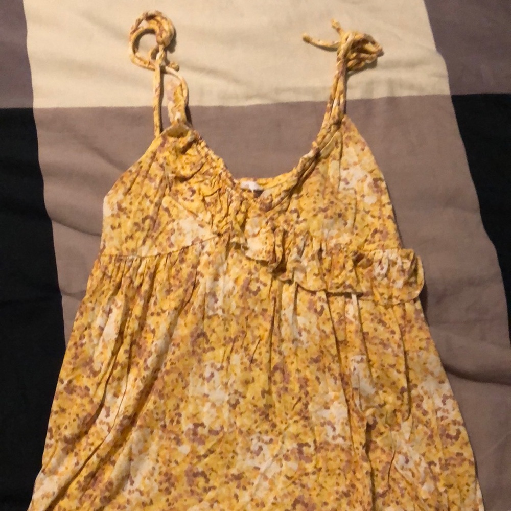 Candie’s yellow tank top